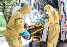 File photo of a patient with Crimean-Congo haemorrhagic fever being transferred to an ambulance.
